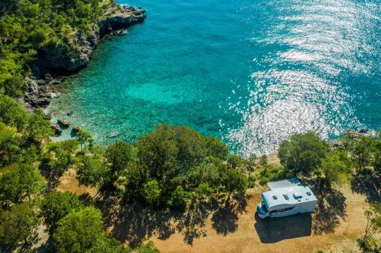 Aerial view of RV campsite on the beach
